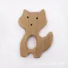 Suministro directo de fábrica palo para morder dientes de bebé Madera de haya diente calmar forma de animal palo para morder dientes morder música