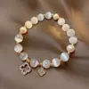 2025 Nuevo Pulsera de Cristal de Ojo de Gato Imitación Trébol de Cuatro Hojas Pulsera de Perlas Elástica Nicho