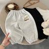 Pantalones de Punto para Niños 2026 Nuevo Estilo Otoño para Niños Bolsillo Cara Sonriente Pantalones Largos Ropa de Bebé Holgada