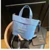Mochila casual de lona confortável estilo coreano, nova bolsa feminina transfronteiriça para o outono de 2025, bolsa de ombro e transversal estilosa