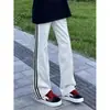 Pantalones de chándal a rayas con dobladillo curvo para hombre y mujer, parche de tres rayas de alta resistencia, corte holgado, caída suave, pierna recta, informales, ligeramente acampanados, pantalones deportivos