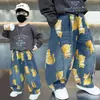 Jeans de primavera y otoño para niños con estampado de gato, estilo coreano, pantalones curvos holgados y elegantes para niños, pantalones de moda para niños pequeños, comercio exterior