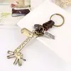Estilo Simple y Lindo Colgante de Jirafa de Metal Encanto para Bolsita de Regalo Pequeña Llavero Unisex de Cuero Trenzado
