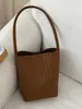 Bolso de hombro de color liso con patrón tejido, de alta calidad, retro, moderno, bolso tipo cubo casual simple y único para el día a día.