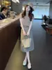 Falda de diseño con abertura estilo retro para mujer, nuevo modelo primavera-verano 2026, de cintura alta, estiliza la figura, falda midi súper elegante y versátil