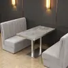 Um conjunto de mesas e cadeiras de jantar para apartamentos de hotel, um conjunto de mesas redondas e longas de luxo leve para restaurantes de hot pot e uma mesa de jantar de ardósia para cafeterias e lojas de chá com leite