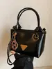 Bolso Pequeño Retro para Mujer 2025 Invierno Nuevo Estilo Versátil Bolso de Hombro Cruzado Bolso de Mano Exquisito Bolso Cubo Venta al por Mayor