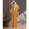 Nuevo conjunto de mujer estilo chino 2026 nueva moda primavera y otoño, elegante, rejuvenecedor, adelgazante, favorecedor de la figura, pantalones de pierna ancha, conjunto de dos piezas