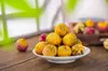 Té aromático de bola de dragón Pu'er hecho a mano de Yunnan transfronterizo té de bola de dragón de jazmín venta al por mayor té aromático de bola de dragón flor de rosa y peonía
