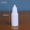 Venta al por mayor de stock 5 10 15 20ml Botella pequeña con gotero Embalaje de pigmento Sub-botella Botella de tinta Punta Botella exprimible