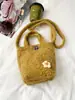 Bolsa de pelúcia tipo balde feminina 2026 nova outono nicho trabalho diversos pequena bolsa tote versátil ombro único transversal