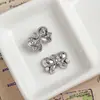 Una Variedad de Colgantes de Lazo de Aleación Dulces y Frescos Joyería Hecha a Mano DIY Collares de Mano Pendientes Colgantes Accesorios Materiales