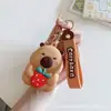 Bolsa de monedas popular de Capibara Llavero Cabeza de silicona Bolsa de almacenamiento para auriculares Bolso colgante Accesorios Regalos pequeños Al por mayor