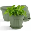 Vendas Diretas de Fábrica E-commerce Transfronteiriço Vasos de Flores de Plástico com Padrão de Boca Redonda Vasos para Plantas Verdes em Relevo Vasos de Flores para Jardinagem Interna e Externa