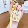 Máquina de Premios de Dibujos Animados Mini Máquina de Lotería Divertido Juguete para Aliviar el Estrés Llavero Colgante para Mochila Máquina de Muñecas Regalo Venta al por Mayor