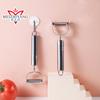 Venta al por mayor de fábrica pelador de acero inoxidable Apple herramientas para frutas pelador de doble cabeza afeitadora de cara sonriente de doble cabeza al por mayor