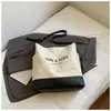 Bolso Casual de Gran Capacidad para Mujer 2025 Nuevo Popular Versátil Bolso de Hombro de Lona Estilo Popular de Celebridad de Internet Bolso Cruzado Tipo Cubo