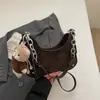 Bolso de Alto Valor Estilo Coreano Otoño 2026 Nuevo Lanzamiento Bolso de Cadena de Nicho Bolso Baguette para Debajo del Brazo Bolso de Hombro Sencillo y Elegante Bolso Cruzado