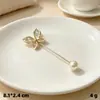 Broche anti-luz broche de perlas de nicho herramienta reductora de talla de cintura botón de pinza de flor para ceñir la cintura pin reductor de talla de jeans