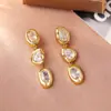 Pendientes Minimalistas de Metal con Circonita de Alta Gama, Moda de Lujo Ligero, Pendientes Largos Únicos, Diseño de Nicho, Exquisitos Accesorios para Orejas