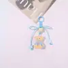 Nuevo Lindo Colgante de Oso Flocado para Bolso Cadena para Teléfono Móvil Llavero de Dibujos Animados Estrella de Cinco Puntas Colgante de Lazo Venta al por Mayor