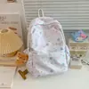 Mochila escolar primaria Yun Xi azul claro estampado completo de estrellas para niña, simple, versátil, para estudiantes de secundaria y preparatoria, alto valor estético, moderna, mochila de doble hombro