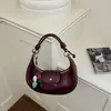 Bolsa de Mão Nova Moda 2026 Bolsa de Mão com Temperamento Versátil Bolsa de Ombro Casual Coreana em Forma de Meia-Lua para Mulheres
