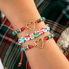 Pulsera elástica navideña para mujer, con diseño de Papá Noel, alce y árbol de Navidad, de cerámica suave y al azar.