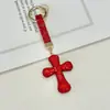 Artículo Popular Transfronterizo: Llavero Colgante Cruz de Arcilla Incrustada de Diamantes para Coche, Llavero Accesorio para Bolso de Teléfono con Diamantes Completos