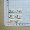 Parches ovalados de oso pequeño, minimalistas y versátiles, estilo coreano para DIY, incluyendo pinzas para flequillo adhesivas de color crema, pinzas de pico de pato, pinzas BB y accesorios de lazo