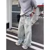 Jeans retro americanos lavados con dobladillo curvo para hombre y mujer, de alta costura, pierna ancha, holgados, diseño deconstruido, pantalones hasta el suelo