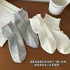 Calcetines de mujer para primavera/verano estilo coreano ins de color liso con borde de volantes hasta la mitad de la pantorrilla con rayas verticales y malla hueca para transpirabilidad