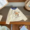 [En Stock] Cy266548 Camiseta de Manga Larga Kidsren 2026 Nuevo Estilo Primavera Tops de Dibujos Animados para Niños Son Casuales y Cómodos