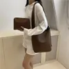 Bolsa de mano tipo tote de gran capacidad para el día a día, nuevo modelo 2026, bolsa para madre e hija, bolso de mano a la moda para el trabajo, bolso tipo cubo versátil para llevar al hombro o debajo del brazo
