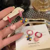Corea del Sur Dongdaemun Globos de Amor Esmaltados de Colores Hebilla de Oreja de Perro Pendientes de Corazón Dulce y Femenino Pendientes Texturizados