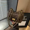 Bolso de hombro acolchado con cadena estilo Chanel, nuevo de primavera y verano, bolso versátil de alta gama para mujer