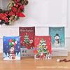 Bolsa de regalo exclusiva transfronteriza bolsa de regalo de Navidad bolsa de papel kraft blanco bolsa de mano con elemento navideño venta al por mayor al contado franqueo