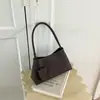 Bolsa de Ombro Trançada Tendência Transfronteiriça para Mulheres Outono 2026 Nova Moda Estilosa Casual para Trabalho Pequena Bolsa de Mão