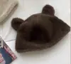 Dulce sombrero de cuenca de felpa con orejas de oso estilo japonés sombrero de pescador femenino otoño e invierno Nuevo sombrero frío de protección para los oídos de imitación de pelo de visón