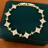 Pulseira fecho flor trevo com zircônia, banhada a ouro real 18k, pulseira de pulso de nicho de luxo leve, joia feminina requintada e versátil
