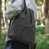 Mochila Ligera Bolsillo con Cierre de Cordón Hombres y Mujeres Cuadros Casual Senderismo al Aire Libre Mochila con Cierre de Cordón Estudiante Bolsa Escolar Moderna