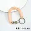 Juego de llaveros y tarjetas con cuerda de resorte de plástico, accesorios para bolsas, cordón elástico de color antipérdida, venta al por mayor
