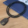 Bodhisattva Kinnamoroll Madera de Agarwood Madera Preciosa Colgante Relieve Unilateral Artesanía Tallado Fino Adorno Cadena para Suéter