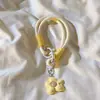 Pulseira Curta Trançada Dopamina para Celular, Cordão para Bolsa de Câmera, Chaveiro, Fones de Ouvido, Pingente de Flor, Pulseira da Moda