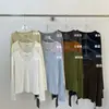 ¡Artículos de calidad de las Trece Líneas de Guangzhou! Camiseta básica top de otoño 2026, corte ajustado, realza la clavícula, superelástica, suave