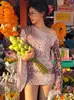 Bestseller de ropa para mujer transfronteriza estilo europeo y americano: estampado de leopardo, cuello asimétrico, manga larga, falda corta, vestido ajustado sexy para vacaciones