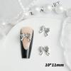 Joyería de aleación para uñas con forma de lazo de alta venta una variedad de accesorios decorativos para horquillas de uñas y pendientes estilo lujo ligero en oro y plata materiales