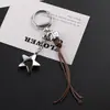 Estilo Ins Cuerda de Cuero Trenzado Colgante de Estrella Llavero Forma de Frijol Hecho a Mano DIY Colgante para Bolsos Materiales Accesorios