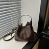 Bolso Cruzado de Cubo de Agua Transfronterizo para Mujer 2026 Otoño/Invierno Nuevo Versátil Bolso de Hombro Cruzado de Mano de Alta Gama para Viaje de Negocios Bolso para Mujer