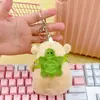 Colgante Capibara Dios de la Riqueza Buda Azafrán Kabi Bala Llavero de Peluche Corazón de Niña Colgante para Mochila Regalo al por Mayor